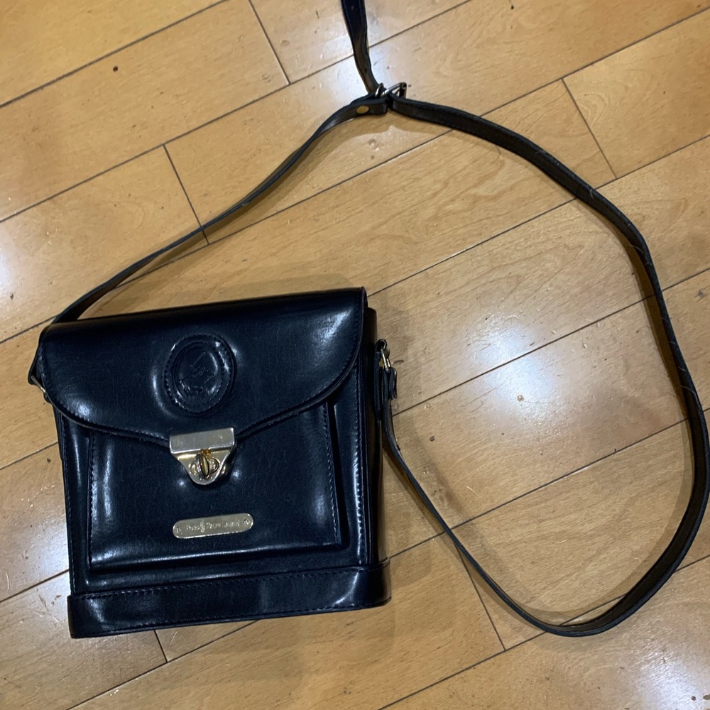 Woman’s hand bag, navy color leather
